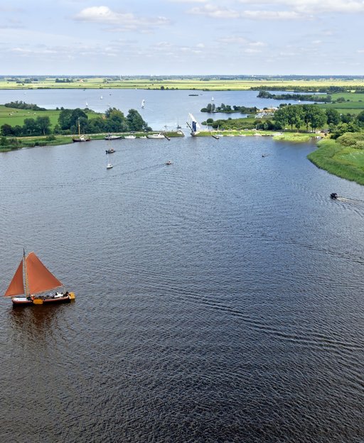 Traditional Frisian sailing boat on the Sneekermeer lake in Friesland, the Netherlands