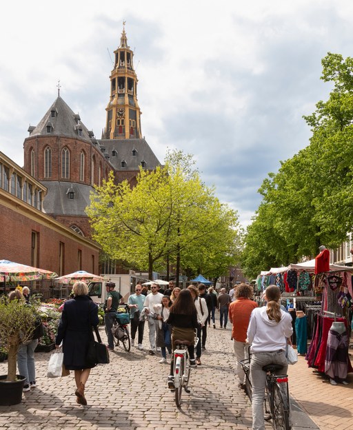 Street market at Groningen city centre with the A-Kerk church in the background, Netherlands